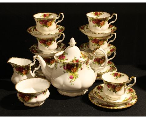 A Royal Albert Old Country Roses tea service for six; a similar trio 