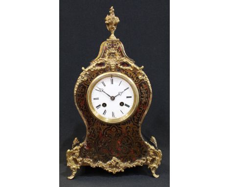 A Louis XV Revival metal mounted boulle and ebonised cartouche shaped mantel clock, 9cm circular dial with Roman numerals, th