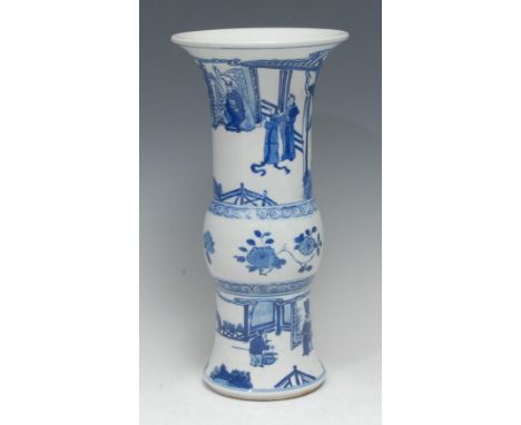 A Chinese gu-shaped beaker vase, painted in underglaze blue with an attended official in a stylized garden structure, the gir