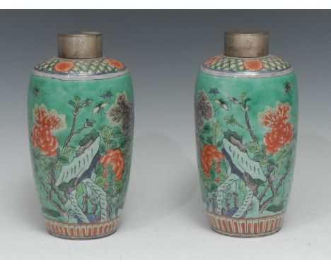 A pair of Chinese famille verte porcelain tapering baluster vases, painted with peonies, cherry blossom, butterflies, and roc