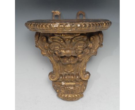 A 19thc century Rococo Revival giltwood and gesso wall bracket, oversailing trefoil top bordered with a gadrooned band, above