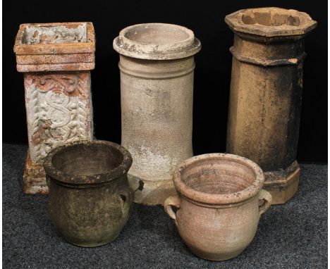 A terracotta 'chimney pot' shaped planter; others, a pair of similar two handled planters (5) 