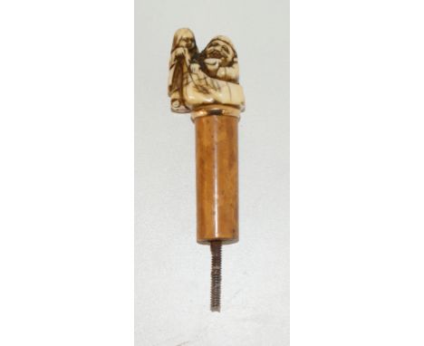 19th century Netsuke on walking stick handle