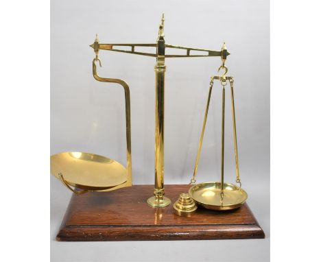 A Set of Late Victorian Brass&nbsp; Balance Scales with a Set of Weights. Rectangular Oak Plinth Base