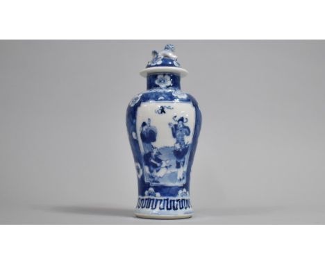 A Small 19th Century Blue and White Baluster Vase and Cover decorated with Figural Cartouches with Musicians, Dignitary and M