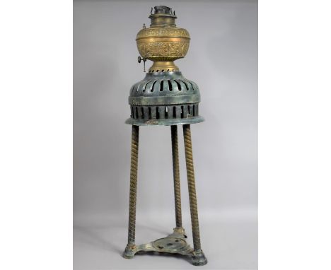 A Late 19th Century Enamel and Brass Combined Oil Lamp and Stove with a Brass Makers Label for F. Barton and Company London, 