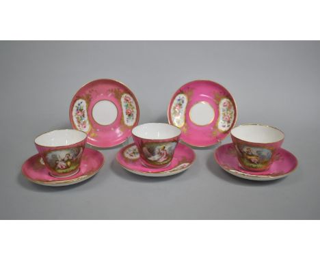 A Set of Three 18th Century Sevres Teacups on Pink Ground with Hand Painted Cartouches Depicting Maidens in Garden with Gilt 