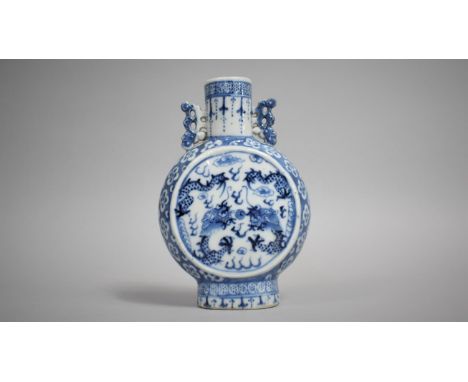 A 19th Century Chinese Porcelain Moon Flask decorated with Dragons Chasing Flaming Pearl, 17cms High, Signs of Restoration 