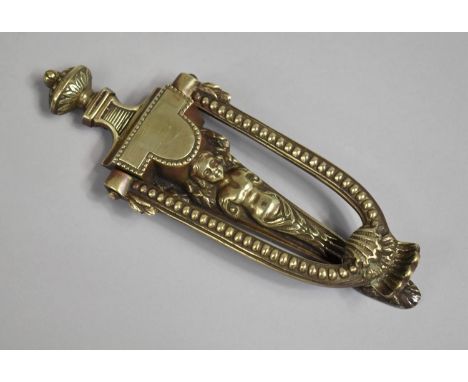 A Brass Door Knocker in the Neoclassical Style, 20cms High 