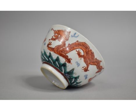 An 18th/19th Century Chinese Tea Bowl Decorated in the Famille Verte Palette with Red Dragons Chasing Flaming Pearl, 10cm Dia