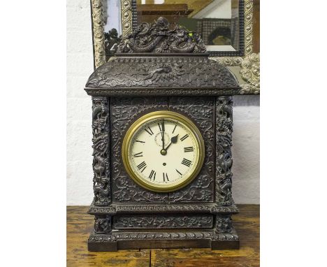 A LARGE CHINESE 19TH CENTURY EXPORT CLOCK, in highly carved ebony/hardwood case, (top removable), 68cm H x 39cm W. 