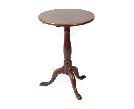 A George III Circular Tripod Table, late 18th century, the fliptop above a vasiform turned support with three cabriole legs a