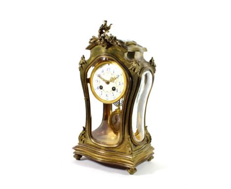 An Art Nouveau Four Glass Striking Mantel Clock, scroll and floral decorated mounts, bevelled glass panels, enamel dial with 