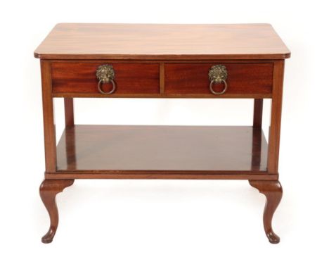 An Early 20th Century Mahogany Serving Table, with reeded edge and two frieze drawers with brass lion mask loop handles, a sh