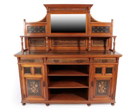 A Gillow and Co Walnut and Marble Wood Sideboard, circa 1880, the mirror back with blind fret carved panels flanking a bevell