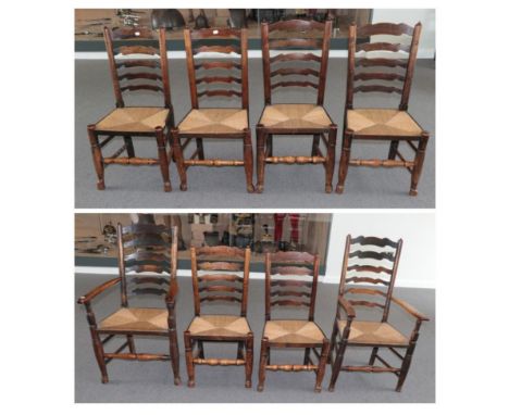 A Set of Eight Ash Rush-Seated Ladder-Back Chairs, Lancashire/Cheshire Region, mid 19th century, including two carvers, the s