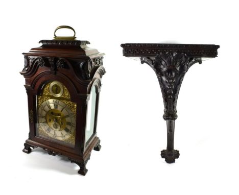 A Chippendale Style Mahogany Pull Quarter Striking Bracket Clock with the Carved Mahogany Wall Bracket, signed Peter Clare, M