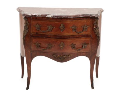 A Louis XV Rosewood, Kingwood and Gilt Metal Mounted Serpentine Shaped Commode, late 19th century, with a pink marble top abo