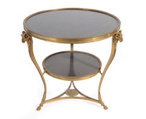 A French Gilt Brass and Marble Two-Tier Gueridon, late 19th/early 20th century, of circular form, on slender cabriole legs su