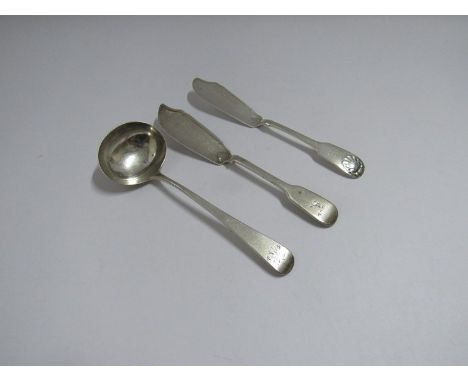 Two silver butter knives, London 1830 &amp; Edinburgh 1837 and ladle all with crested monogrammed handles, 150g
