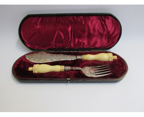 A John Round and Son Ltd silver serving knife and fork set in lined fitted case, ivory handles 