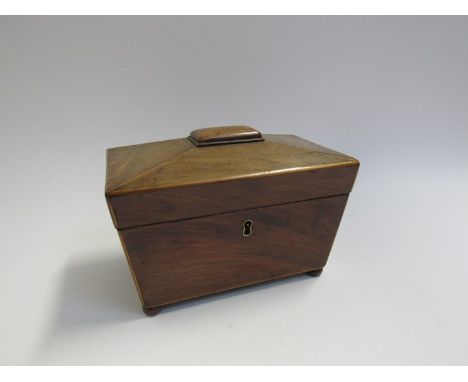A 19th Century twin compartment tea caddy, raised on squashed bun feet