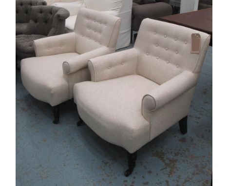 ARMCHAIRS, a pair, button back in oatmeal fabric on front castors, 73cm. (2)