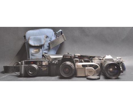 A group of vintage retro mid century circa 1970’s and later 35mm cameras. The collection comprising of a Canon AE-1 complete 