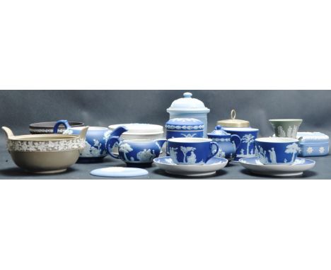 A large collection of vintage 20th century Wedgwood Jasperware comprising of urns, plates, dishes and more. All having raised