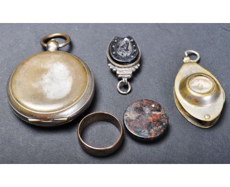 A collection of vintage mid 20th Century and earlier compasses to include a Victorian horseshoe compass, an eye glass and com