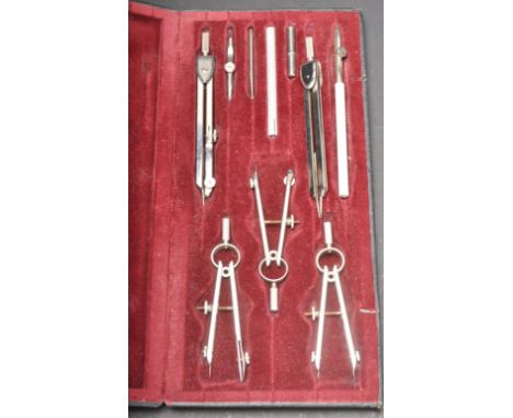 A mid 20th Century engineers compass draughtsman's set housed in a leatherette case with a red velvet interior.&nbsp;