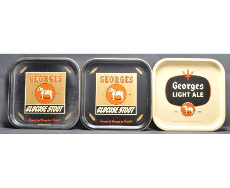 A set of three vintage retro mid 20th century circa 1970’s Bristol interest pub advertising metal serving trays for Georges b