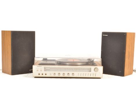 A vintage retro mid 20th century circa 1980’s Sanyo G2003 Stereo Music Centre. The integrate Hi-Fi system comprising of a rec