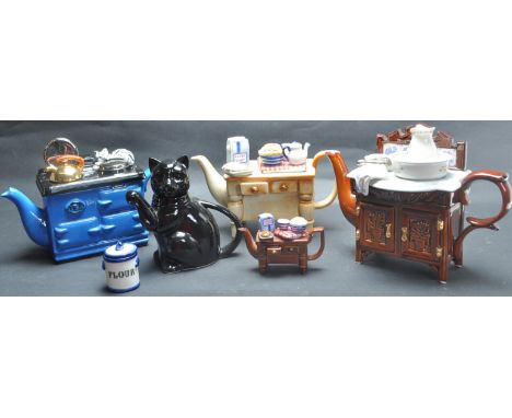 A collection of three contemporary original Cardew Disney ceramic teapots to include chest of drawers, washstand, etc. Togeth