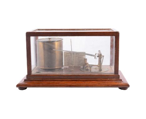 Oak cased barograph, moulded plinth, width 37cm, with a set of paper charts.