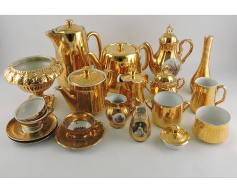 Two Royal Worcester gilded part tea services comprising three pieces, one of fluted pattern, together with sundry gilded cabi