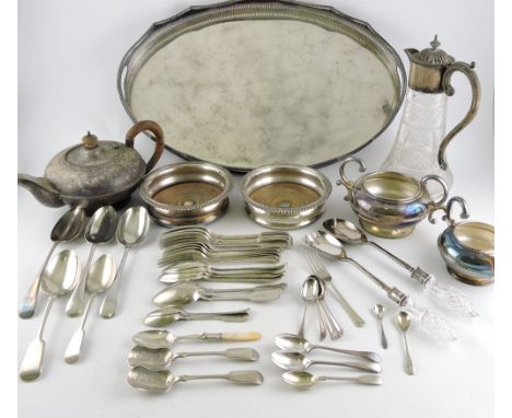 A cut glass claret jug with silver plated mounts, H. 27cm, together with a pair of bottle coasters, three piece tea service, 