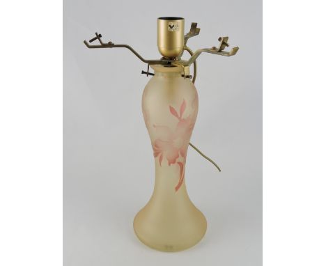 An etched glass table lamp. of baluster form and decorated with a pink flower, H. 38cm