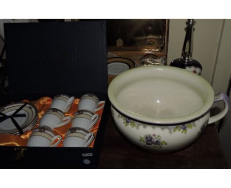 A Bavarian Greek Key pattern 12-piece tea set, together with a boxed coffee set, porcelain table lamp and a chamber pot.