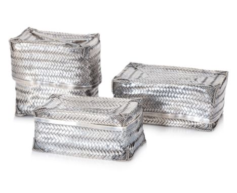 A SET OF THREE CAMBODIAN BASKET WEAVE SILVER BOXES
Two graduated rectangular casket form boxes with double-walled sides plait