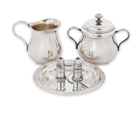 A GROUP OF CHRISTOFLE SILVER PLATED TABLE WARES
Comprising: a covered twin handled sugar bowl; a milk jug; a circular dish; a