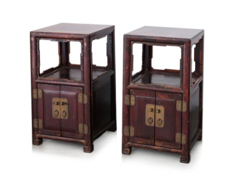 A PAIR OF CHINESE SQUARE SIDE CABINETS
With open shelf framed by archic cscroll mouldings, the lower portion fitted with a pa