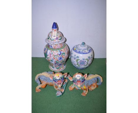 A large modern ceramic Oriental style globular jar and cover; a large similar ginger jar and cover; and a pair of decorative 