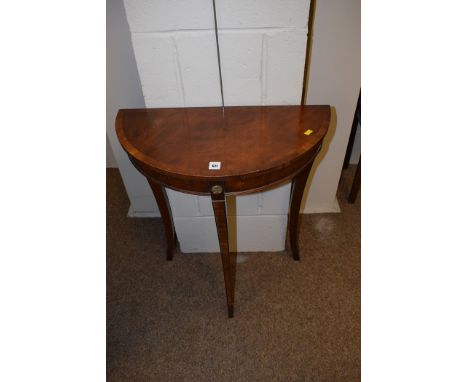 A reproduction mahogany console table, 50cms wide.
