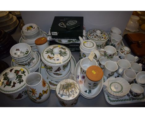 Portmeirion ceramics "Botanic Garden" pattern, to include: tureens, vases, bowls, cups, a teapot, plates, and other items.