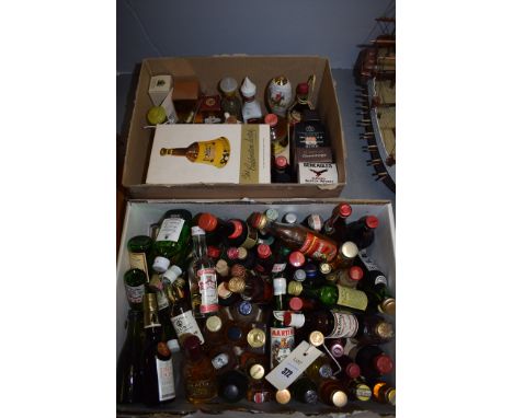 A collection of miniature liqueurs, to include: Cluny Scotch Whisky, Smirnoff Vodka, Gordons Special Dry London Gin, Tia Mari