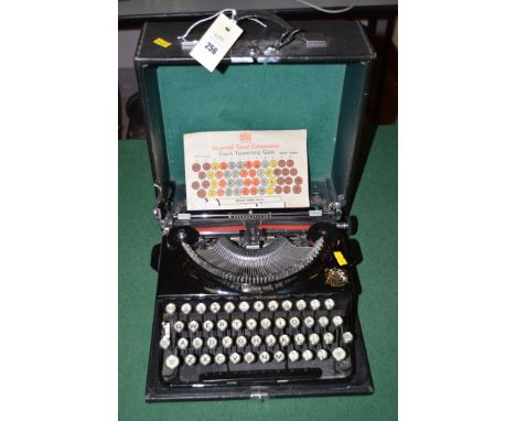 An Imperial 'Good Companion' touch typewriter, in original leather case.