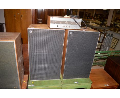 A pair of Leak Model 2060 three-speaker system speaker cabinets in teak; and a Leak Delta 30 amplifier.