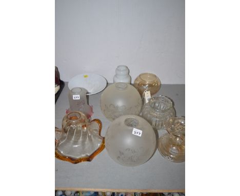 Clear and opaque oil lamp shades, various designs.