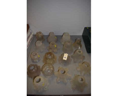 Clear and opaque glass oil lamp shades, various designs.